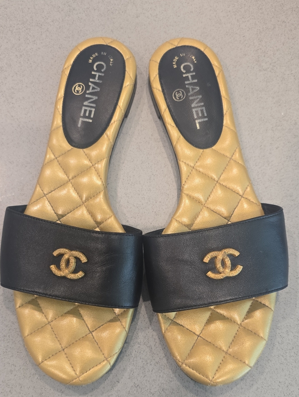 CHANEL Black Leather & Gold Quilted Slip-On Mules